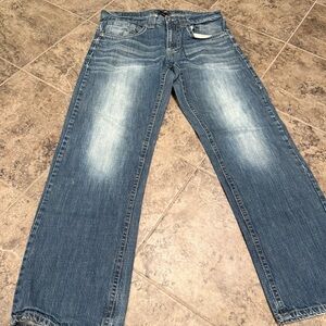 Men's Blue irreverent jeans with a little mark